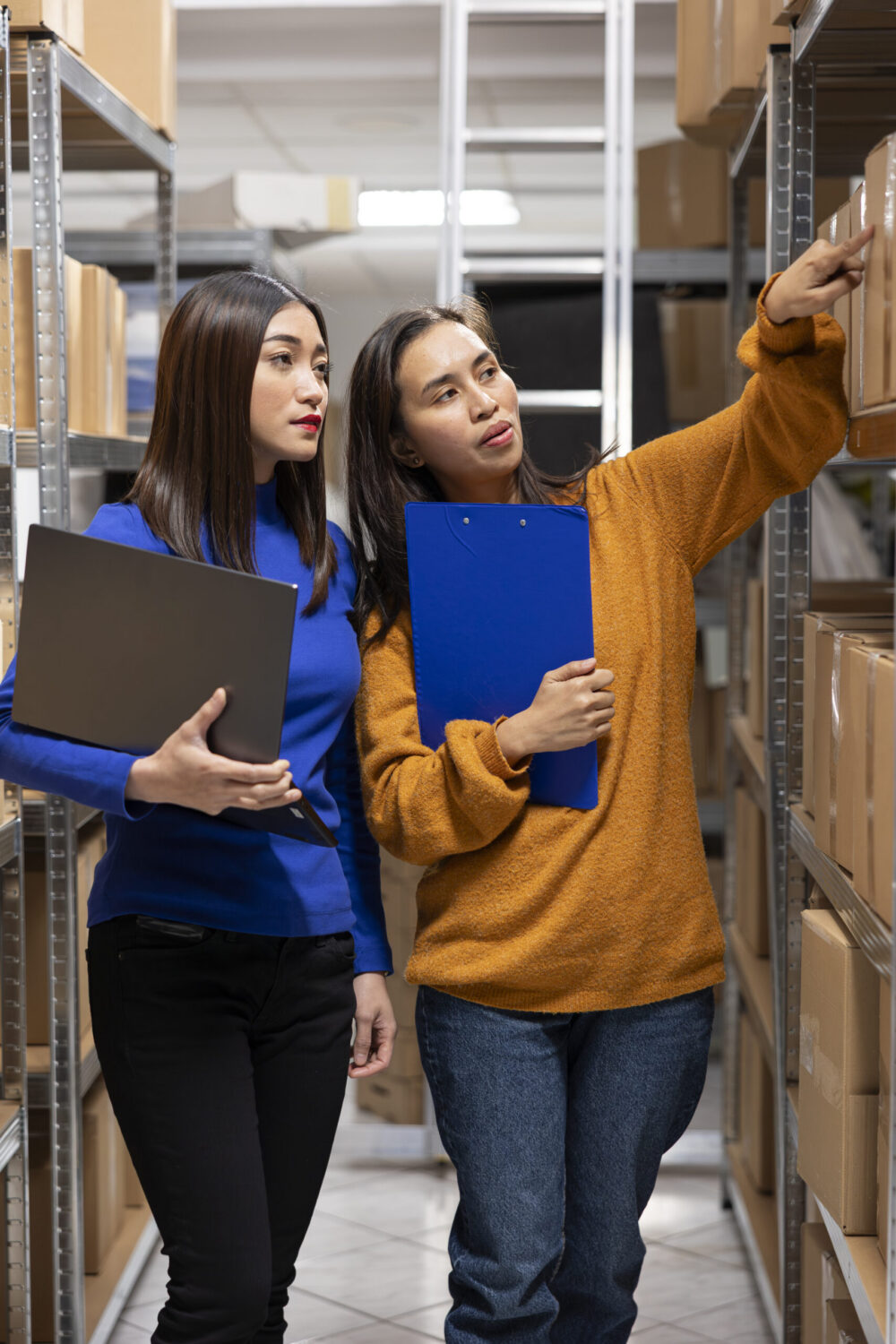 two women going over inventory for a local business