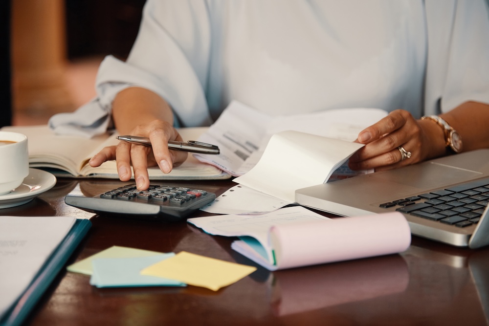 a small business owner going over paper work