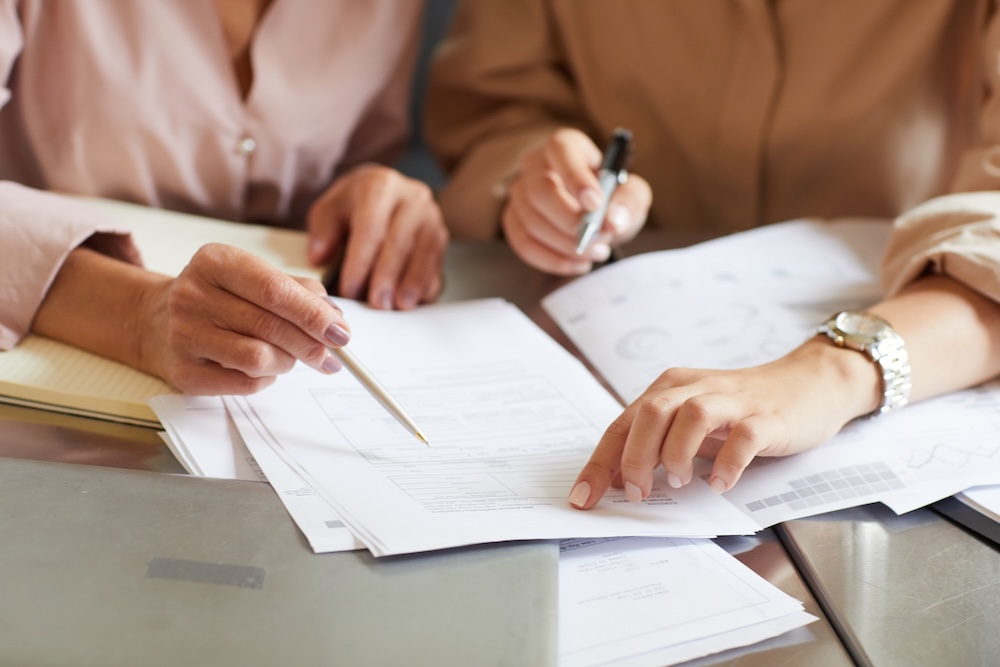 people going over documents